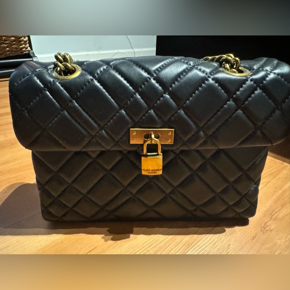Black Kurt Geiger leather purse with gold chain